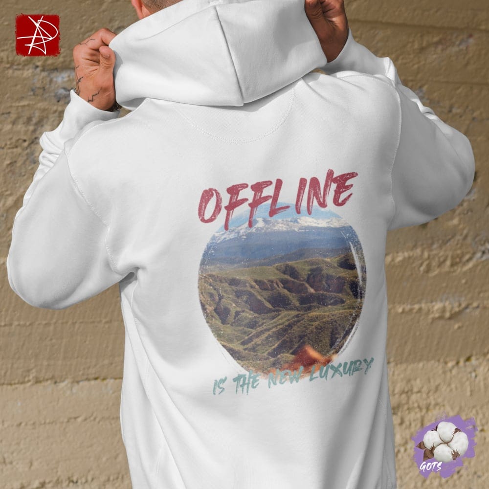 Unisex organic cotton hoodie with “Offline is the New Luxury” quote and mountain design and front pouch pocket – sustainable, GOTS certified, and eco-friendly fashion.